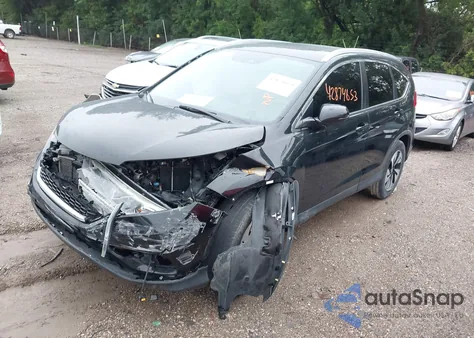 2015 Honda Cr-V Touring z USA, uszkodzony, nr VIN 5J6RM4H96FL130288